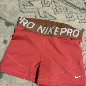 Nike Women's Athletic Shorts in Red and Brown